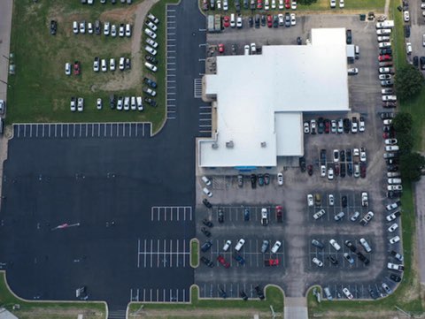 Aerial view of commercial parking lot paving and asphalt installation