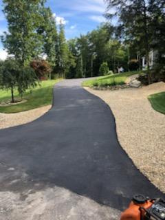 Smooth blacktop residential driveway paving project