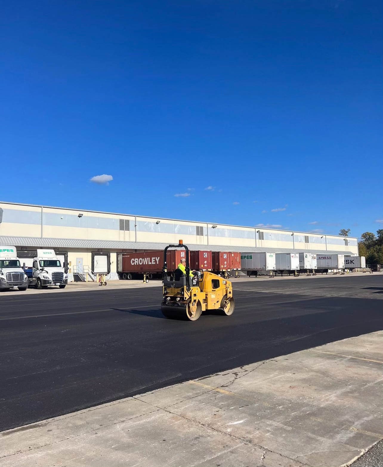 Industrial asphalt paving at warehouse facility