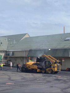 Commercial asphalt paving equipment resurfacing retail property
