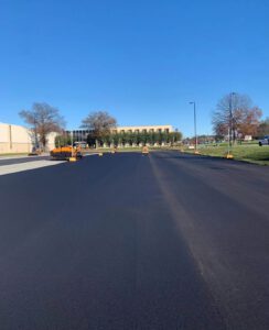 Freshly paved industrial roadway and parking area