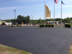 Newly paved commercial parking lot with smooth asphalt finish